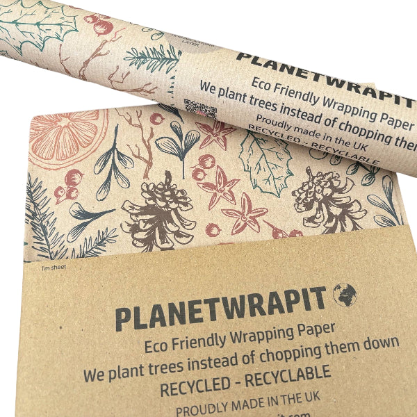 PlanetWrapI recycled kraft wrapping paper in Christmas dried orange (brown background with images of dried oranges, pine cones, foliage)