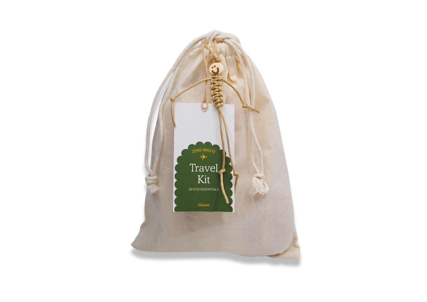 Moonie sustainable travel kit cotton bag with paper label saying "Zero waste travel kit 10 eco essentials"
