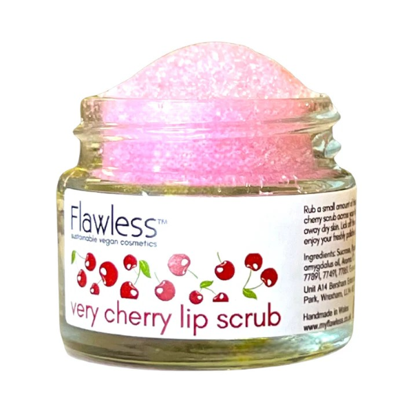 Vegan lip scrub in luscious lime shown in glass jar with lid off