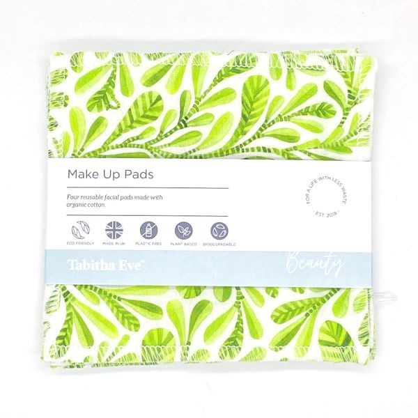 Reusable make up pad in Jungle leaf design (white background with bright green leaves), shown with paper label reading 'Make Up pads, Four reusable facial pads made with organic cotton'