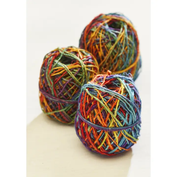 Rainbow hemp twine yarn (three balls) shown close up