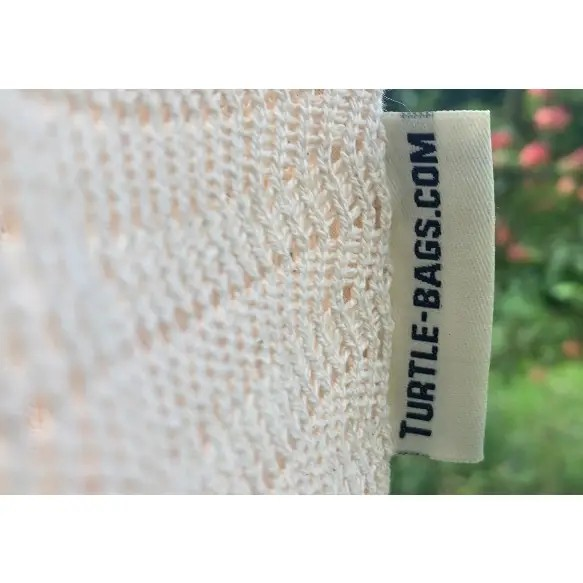 Lace bag in natural pale cream colour close-up