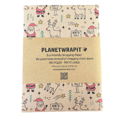 PlanetWrapIt recycled kraft wrapping paper in Christmas Santa and Rudolph (brown paper with printed Santas, Rudolphs and North Pole signs) with PlanetWrapIt paper label