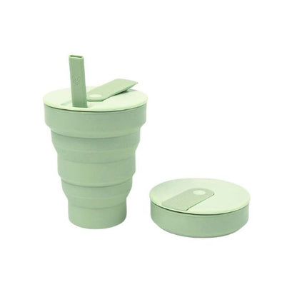 Hunu 16oz collapsible reusable cup in sage green, portable and eco-friendly for drinks on the go.