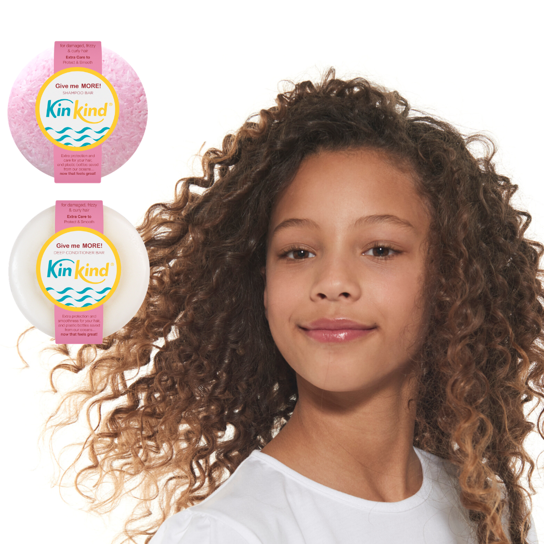 KinKind Give me MORE! deep conditioner bar for damaged, frizzy, curly hair, shown in a natural, eco-friendly haircare setting
