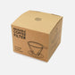 Cardboard box containing stainless steel reusable coffee filter packaging on a white background