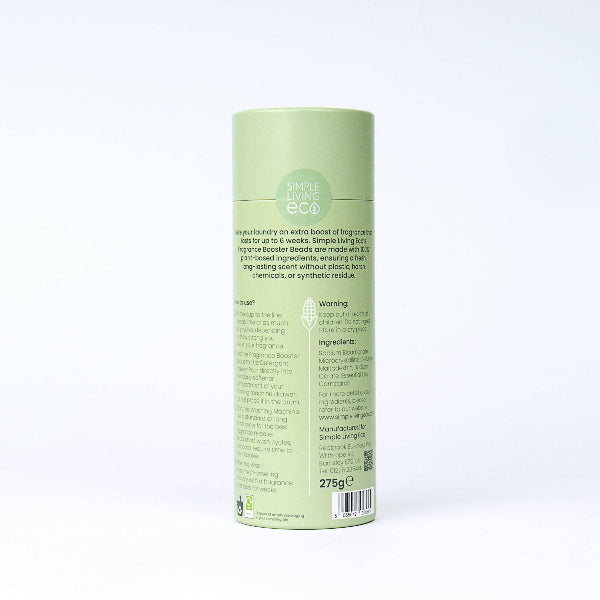 Green cardboard cylinder box labelled 'Simple Living Eco Fragrance Boosters' on a white background showing rear of box