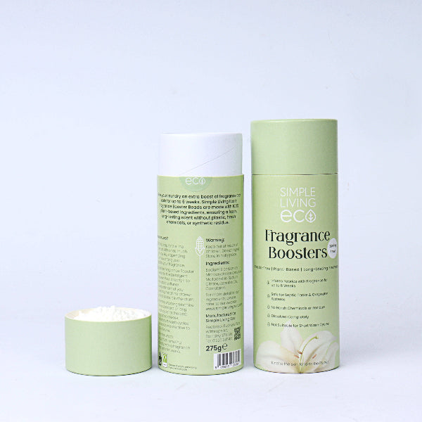 Two green cardboard cylinder boxes labelled 'Simple Living Eco Fragrance Boosters' on a white background, one shown with lid off