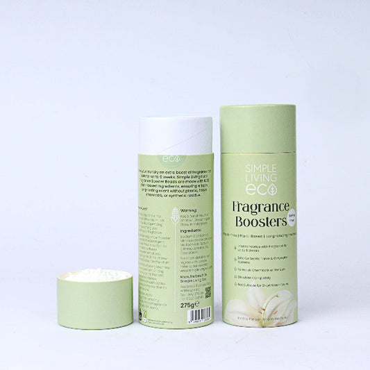 Two green cardboard cylinder boxes labelled 'Simple Living Eco Fragrance Boosters' on a white background, one shown with lid off