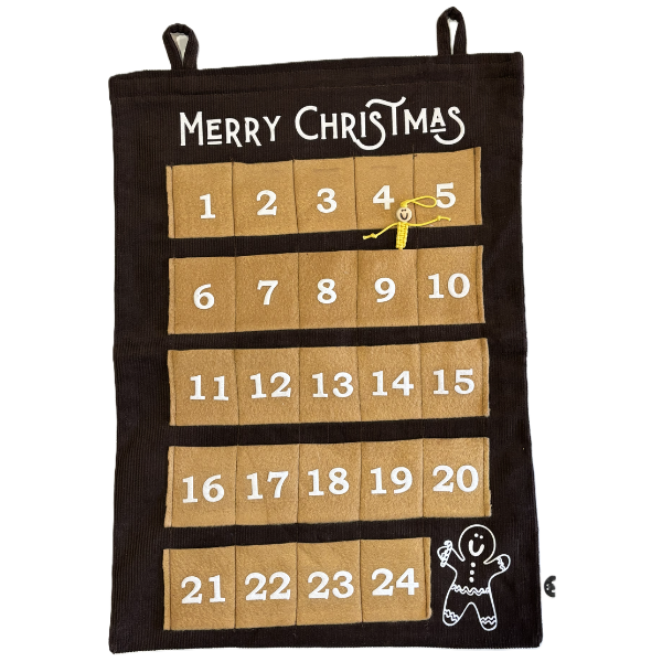 Handmade advent calendar with mustard numbered felt boxes