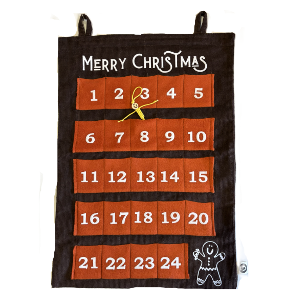 Handmade advent calendar with red numbered felt boxes