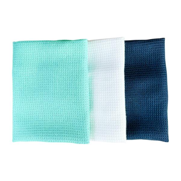 Three Seep all-purpose cloths cloths in mint green, white, and dark blue, arranged side by side on a plain white background.