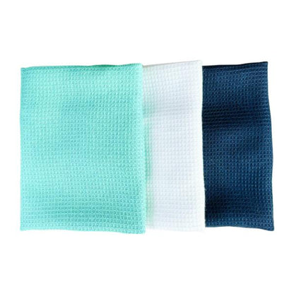 Three Seep all-purpose cloths cloths in mint green, white, and dark blue, arranged side by side on a plain white background.