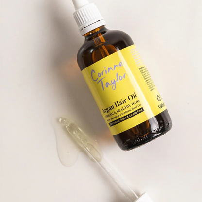 Corinne Taylor natural argan hair oil in glass bottle with oil dropper