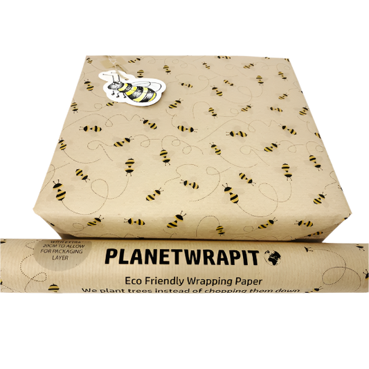 Eco-friendly recyclable wrapping paper in bees design (brown paper with little bees flying around) shown as a wrapped parcel