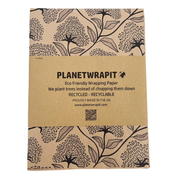 Planet Wrapit eco-friendly kraft wrapping paper with black floral design and PlanetWrapIt paper label.