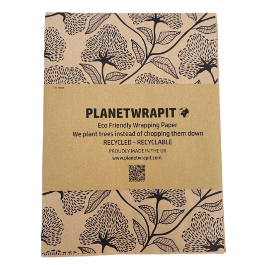 Planet Wrapit eco-friendly kraft wrapping paper with black floral design and PlanetWrapIt paper label.