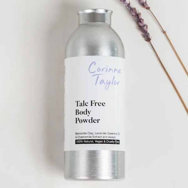 Corinne Taylor natural talc-free body powder in aluminium tin with lavender sprigs alongside