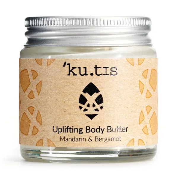 Jar of Kutis uplifting body butter in Mandarin and Bergamot on a white background