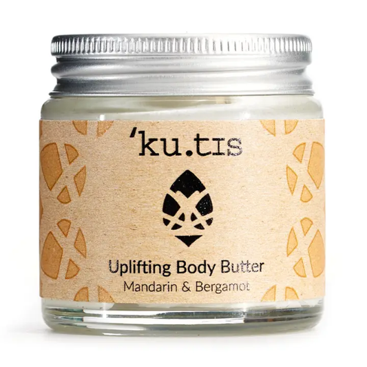 Jar of Kutis uplifting body butter in Mandarin and Bergamot on a white background