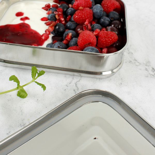 Buruni two-tier leak-resistant stainless steel lunchbox shown with yoghurt and fruit in top layer