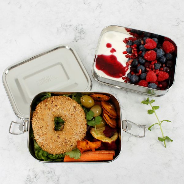 Buruni two-tier leak-resistant stainless steel lunchbox shown with yoghurt and fruit in top layer and a bagel in lower level