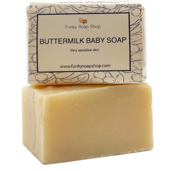 Buttermilk baby soap bar with paper packaging from Funky Soap Shop on a white background