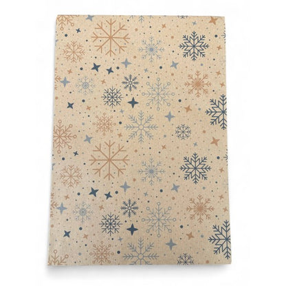 PlanetWrapIt recycled kraft wrapping paper in Christmas Snowflakes (brown paper with printed colourful snowflakes