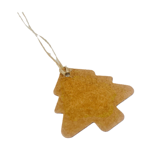 Kraft paper gift tag in shape of Christmas tree with natural twine