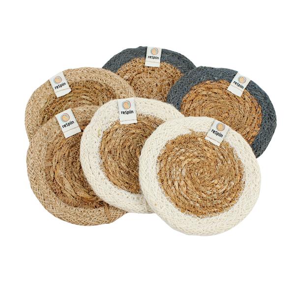 Set of 6 seagrass coasters with jute trim in natural tones  