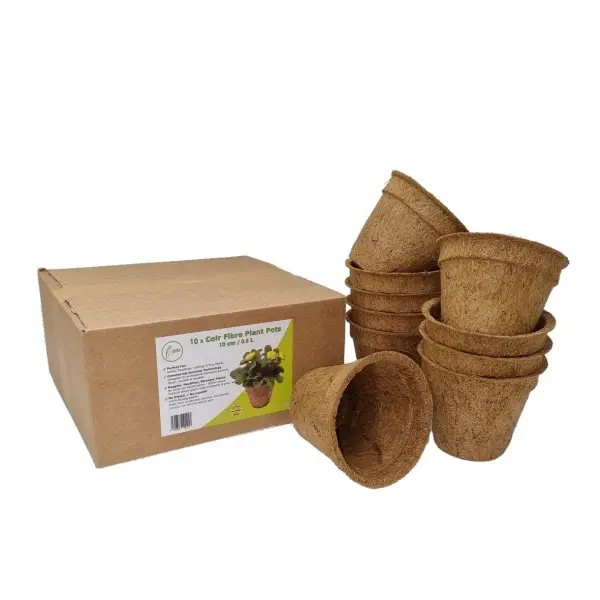 Coco coir biodegradable and reusable plant pot, set ofn 10, shown next to cardboard box packaging