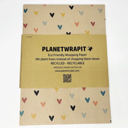 Eco-friendly wrapping paper from PlanetWrapit on brown kraft paper with colourful hearts and a paper label