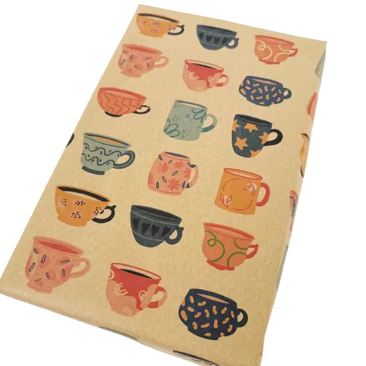 Eco-friendly wrapping paper from PlanetWrapit, brown kraft paper with little colourful cups of tea
