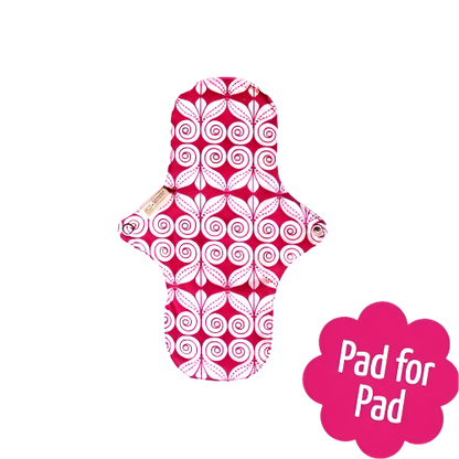 Eco Femme natural organic period day pad, showing 4 backing pattern (red and white swirls)