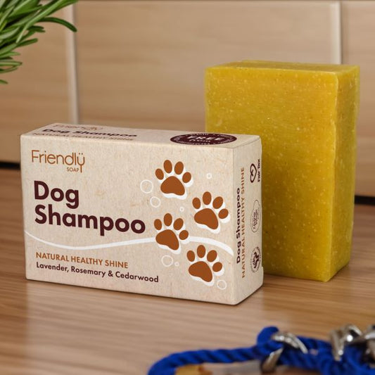 Dog shampoo bar shown alongside cardboard box packaging