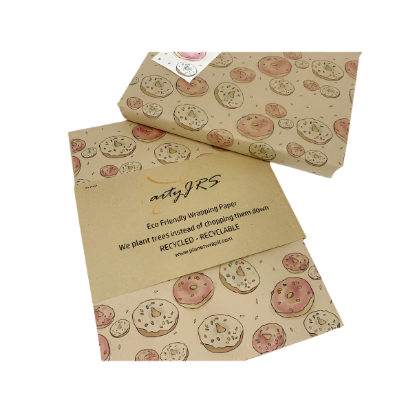 Eco-friendly recyclable wrapping paper in doughnuts design (brown paper with pink and white sprinkled doughnuts) shown alongside a wrapped box