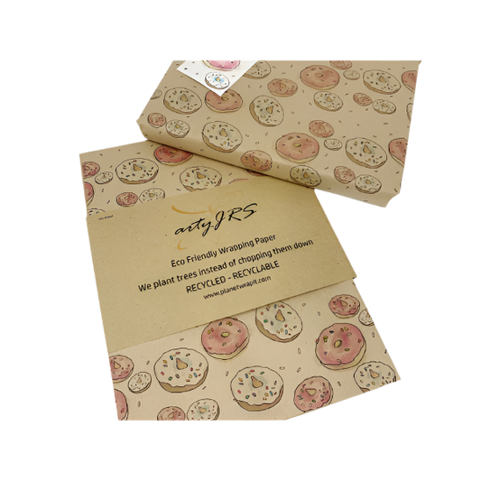 Eco-friendly recyclable wrapping paper in doughnuts design (brown paper with pink and white sprinkled doughnuts) shown alongside a wrapped box