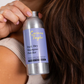 Corinne Taylor dry shampoo (dark) powder in aluminium tin shown in a hand next to dark hair