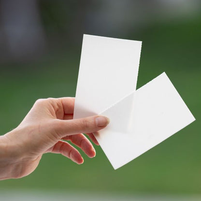 Eco laundry detergent strips in a hand 