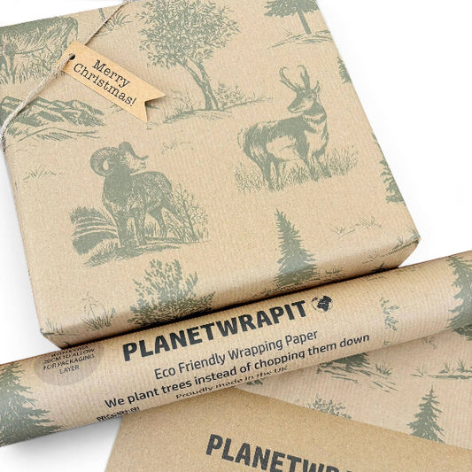 Planetwrapt Eco Friendly Wrapping Paper wrapped around a gift, featuring a woodland theme with illustrations of a ram and a deer in muted green on a natural kraft paper background.