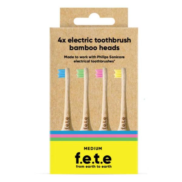 Cardboard packaging containing four medium electric toothbrush bamboo heads. The kraft-paper box shows four brush heads with different bristle colours (blue, green, pink and yellow). 