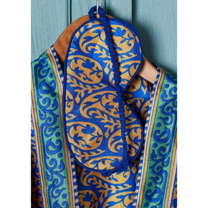 Recycled eye mask with blue background and gold decoration