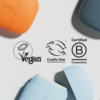 Fussy product packaging with Vegan, Cruelty Free International, and Certified B Corporation logos on a light grey background.