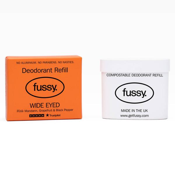 Fussy deodorant refill in orange cardboard packaging Wide Eyed on a white background