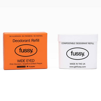 Fussy deodorant refill in orange cardboard packaging Wide Eyed on a white background