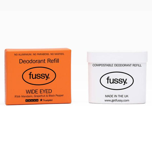 Fussy deodorant refill in orange cardboard packaging Wide Eyed on a white background