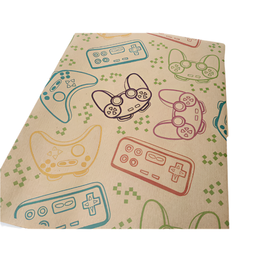 Eco-friendly recyclable wrapping paper in gamer design (brown paper with colourful gamer handsets) shown as single sheet