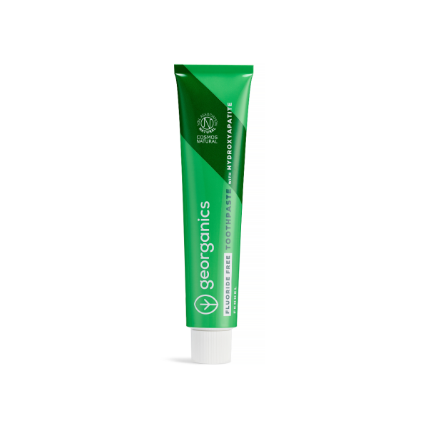 Green tube of Georganics fluoride-free fennel toothpaste on a white background