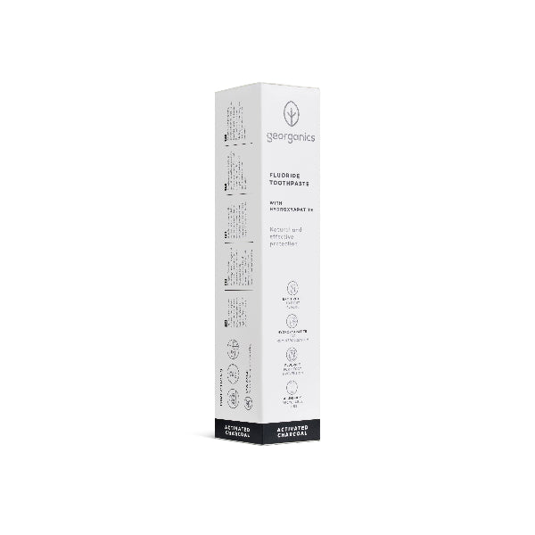White box of Georganics toothpaste activated charcoal on a white background