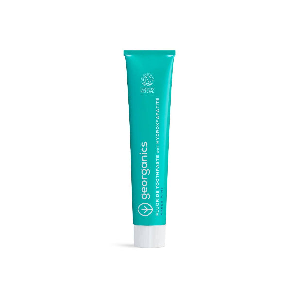 Georganics fluoride toothpaste with hydroxyapatite and fresh mint flavor for natural oral care and cavity protection.